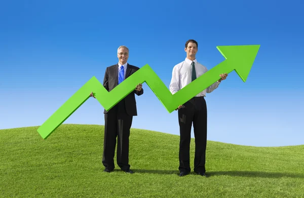 Two Businessmen holding increase graph — Stock Photo, Image