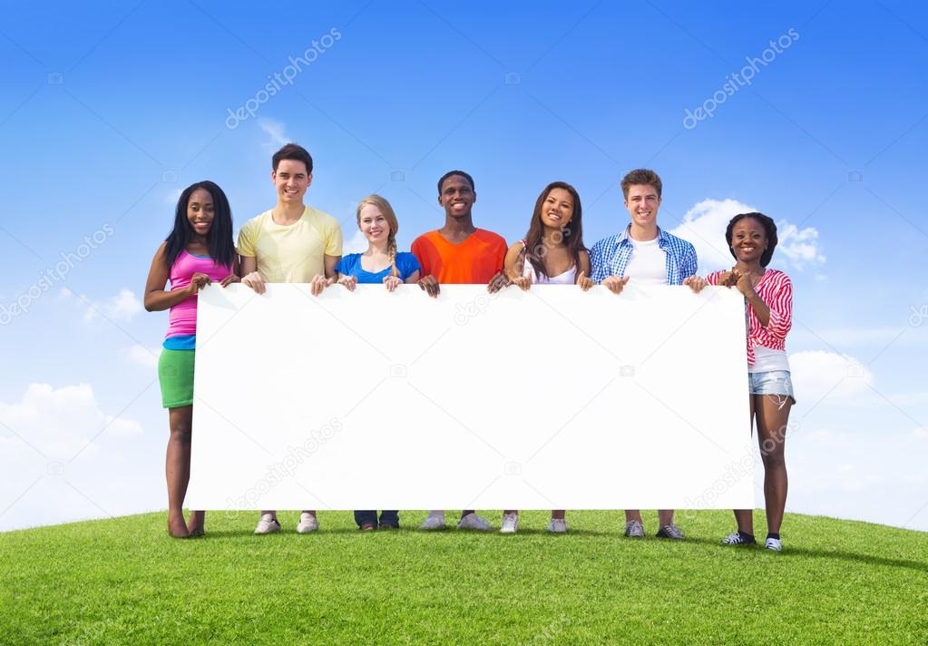 Teenagers Holding Empty Billboard