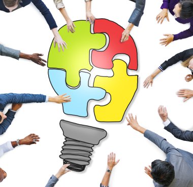 People Forming Light Bulb Puzzle clipart