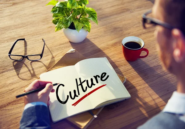 Empresario con nota sobre la cultura — Foto de Stock