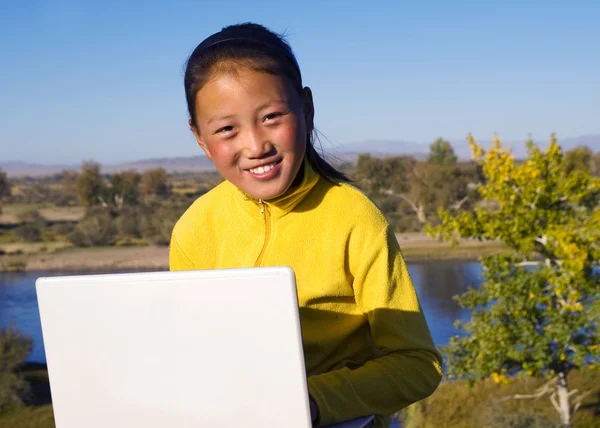 Mongolian Girl with Laptop by Lake — Stock Photo, Image