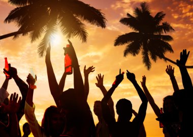 Multi-ethnic People Partying on beach clipart