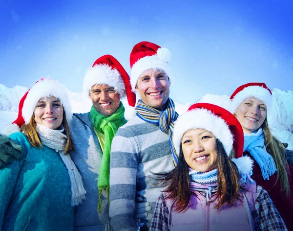 Cheerful Friends in Christmas hats — Stock Photo, Image