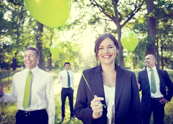 Business People with balloons — Stock Photo, Image