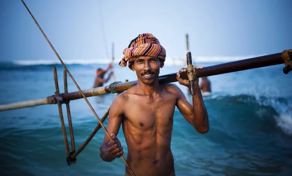 Gülümseyen balıkçı — Stok fotoğraf