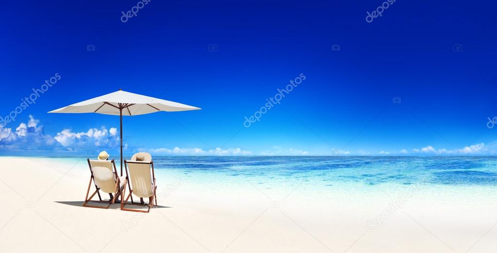 Couple Relaxing on  Beach