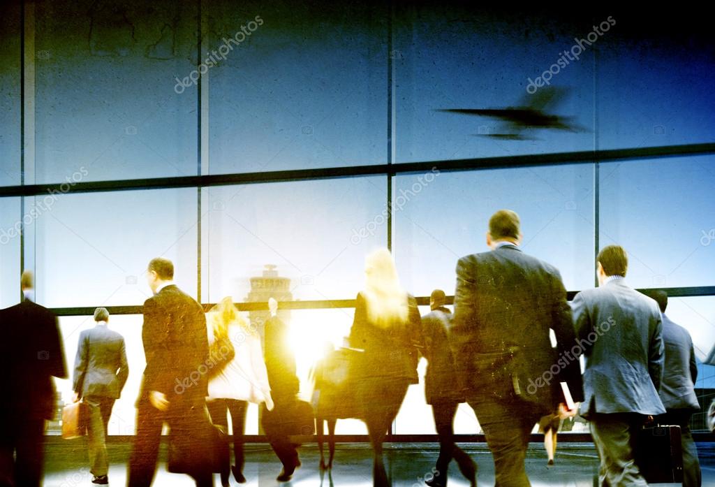 Business People Rushing in Airport