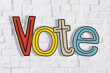 Bir tuğla duvar üzerinde kelime oy