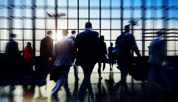 Commuters walking in airport