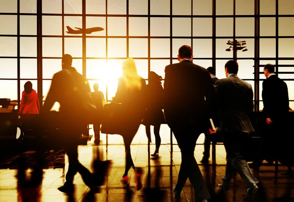 Commuters walking in airport — Stock Photo, Image