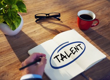Businessman Writing 'Talent'