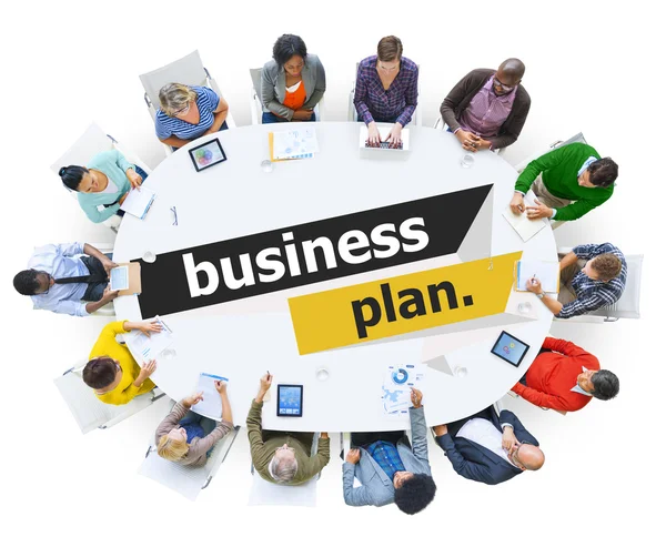 People around table with Business Plan — Stock Photo, Image