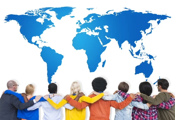 Group of multi ethnic people with world map — Stock Photo, Image