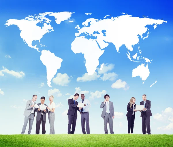 Business people with world map — Stock Photo, Image