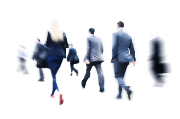 Pessoas de negócios andando na hora de ponta — Fotografia de Stock