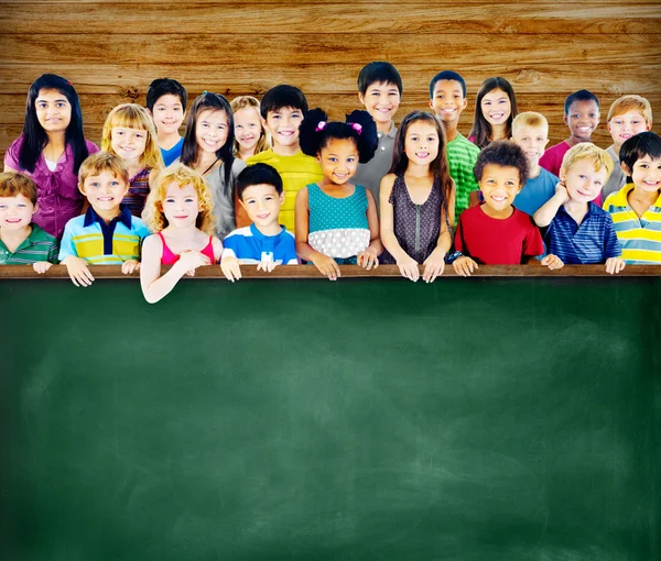 Group of children with school board — Stock Photo, Image