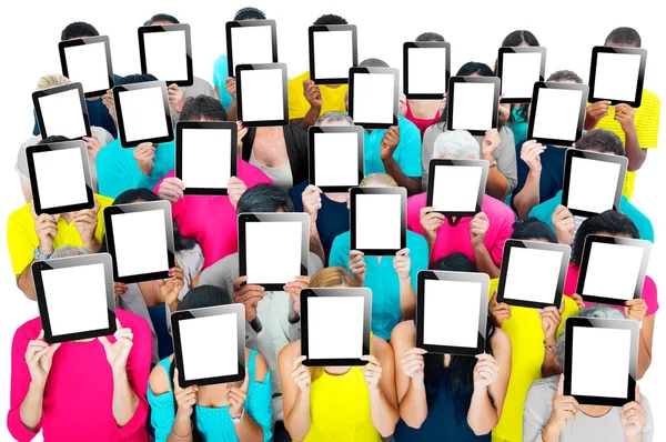 People with Digital Tablets pc covering their  faces — Stock Photo, Image