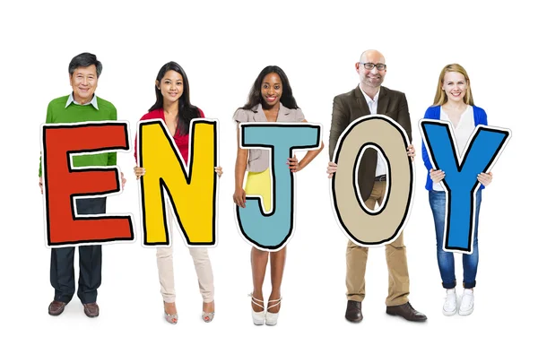 Group of People Holding Enjoy Letter — Stock Photo, Image