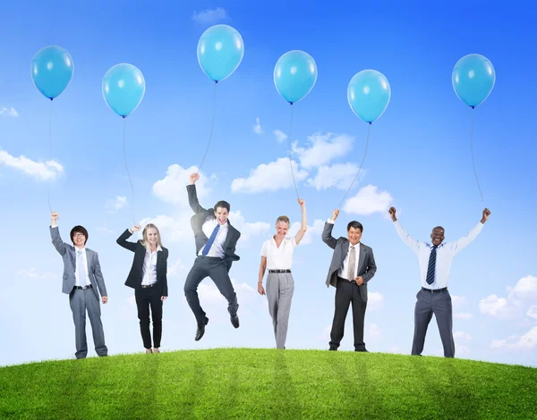 Empresários com balões — Fotografia de Stock
