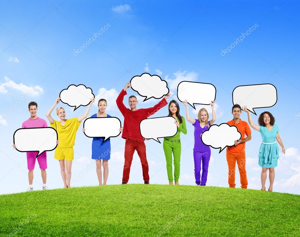 Diverse people with Speech Bubbles at field