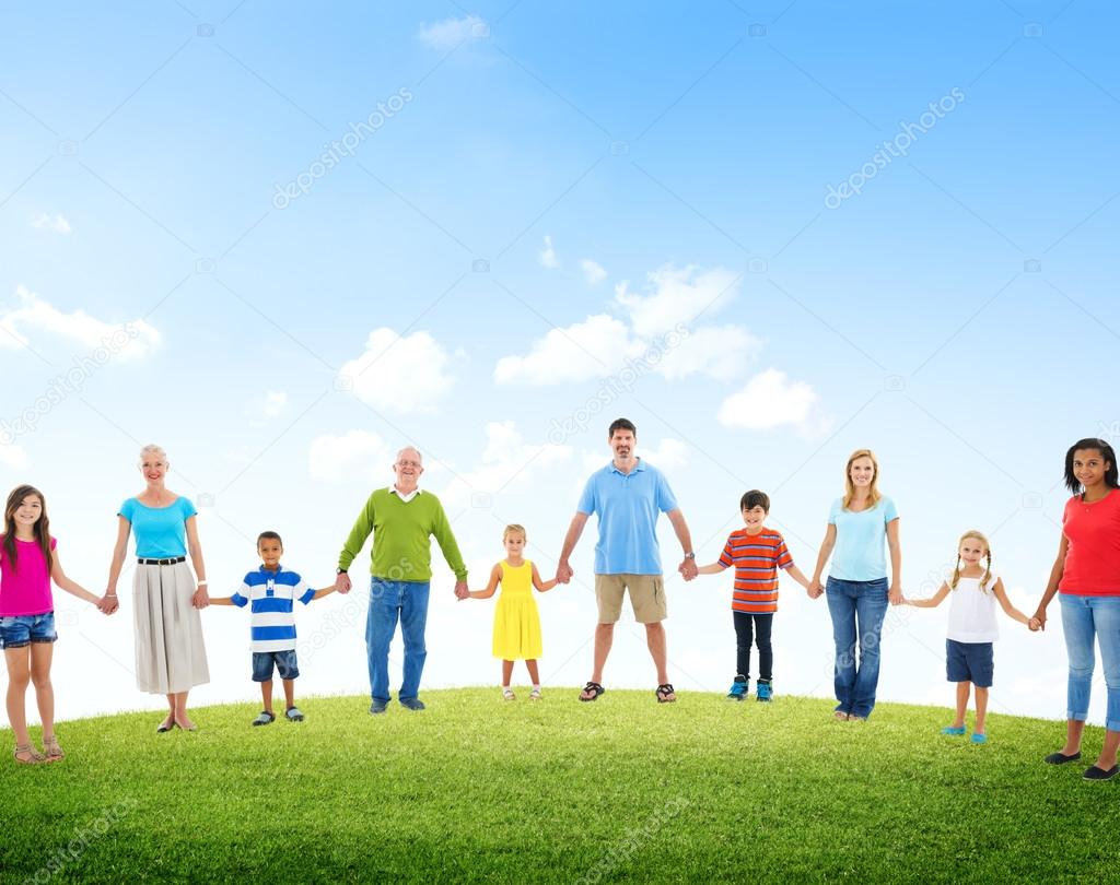 group of Diverse families at field