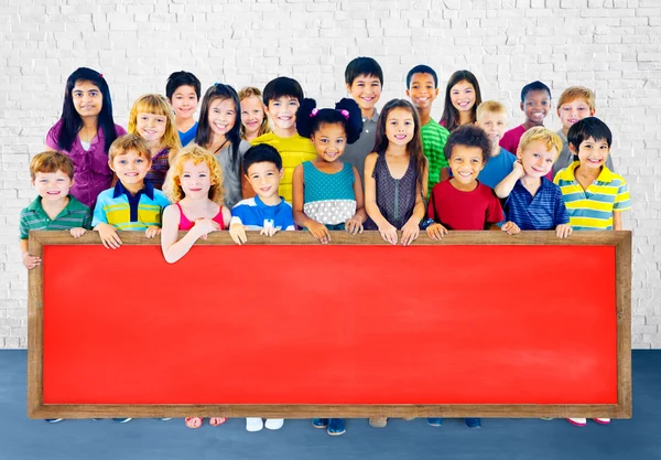 Group of Multiethnic children with blackboard — Stock Photo, Image