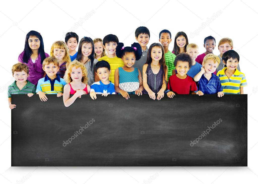 Group of Multiethnic children with blackboard