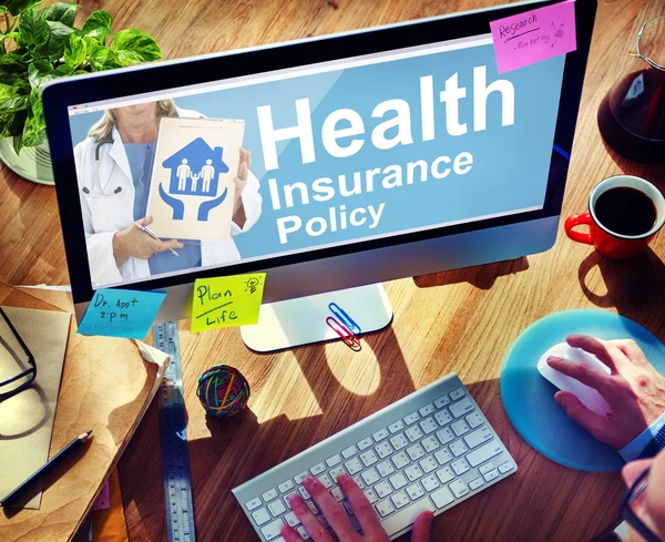 Man using computer with Health Insurance Concept — Stock Photo, Image