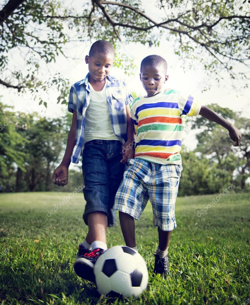 Happy African boys playing with a ball — Stock Photo © Rawpixel #71685537