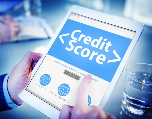 Handen met tablet met Credit Score — Stockfoto