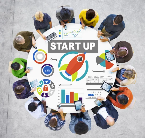 People around table with Start up Concept — Stock Photo, Image