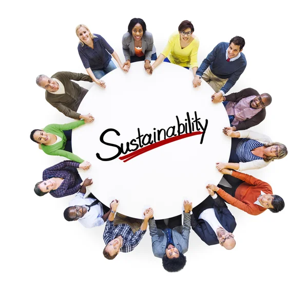 Mensen rond duurzaamheid woord — Stockfoto