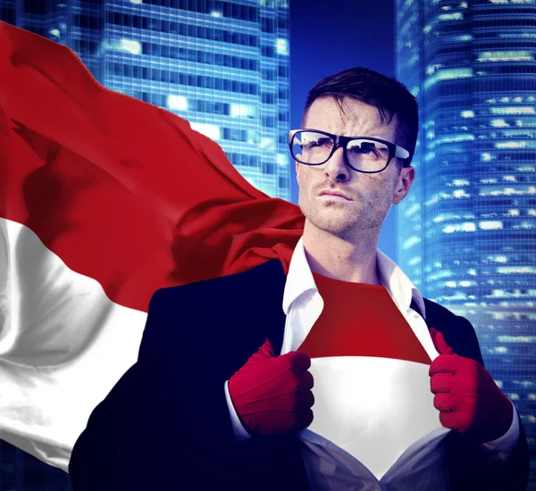 Affärsman superhjälte med Indonesien flagga — Stockfoto