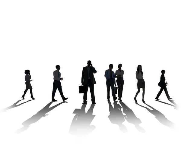 Silhouettes of Business People Walking — Stock Photo, Image