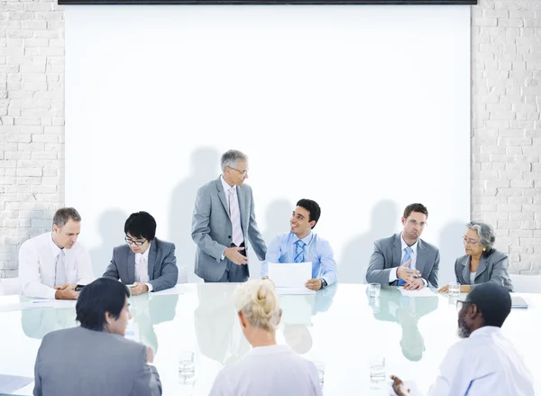 Gente de negocios en reunión corporativa —  Fotos de Stock