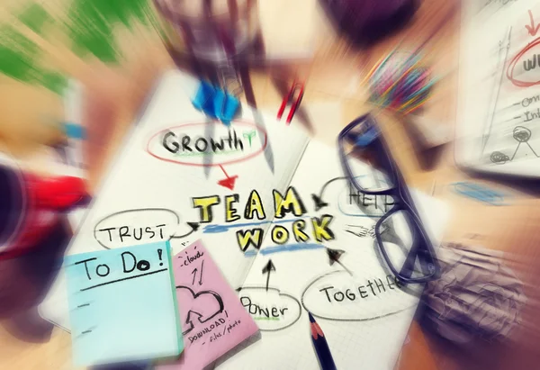 Notizblock und Teamwork — Stockfoto