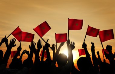 Group of People Waving Flags of Morocco clipart