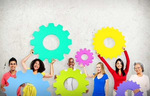 Diversity People holding Gears — Stock Photo, Image