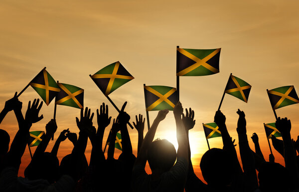 Group of People Waving Jamaica Flags