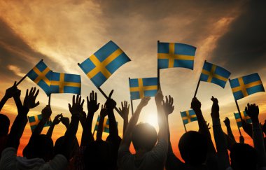 People Waving Swedish Flags clipart