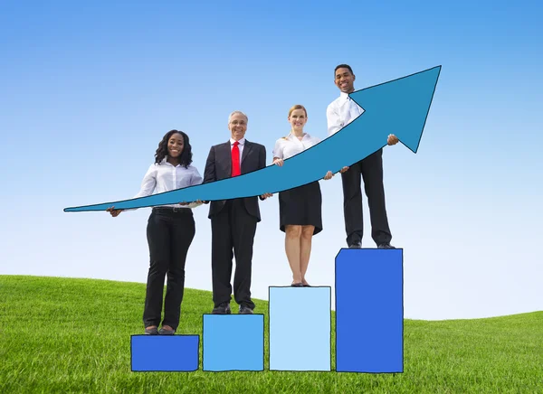 Business people stand on diagram — Stock Photo, Image