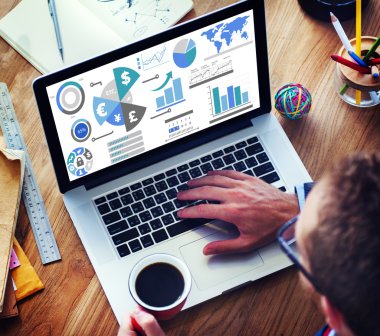 Man and Global  Financial Business Economy on laptop