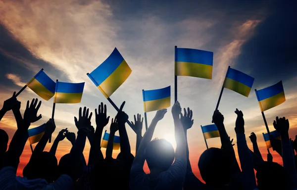 People Waving Ukrainian Flags