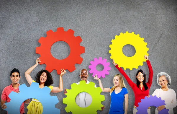 Diversity People holding Gears — Stock Photo, Image