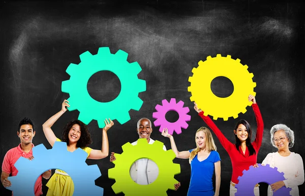 Diversity People holding Gears — Stock Photo, Image