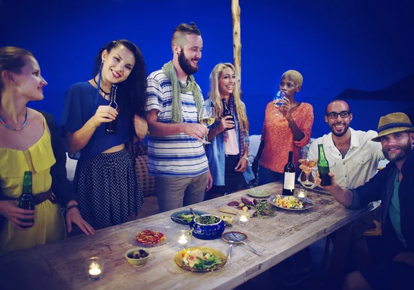 Friends hanging out at outdoors party — Stock Photo, Image