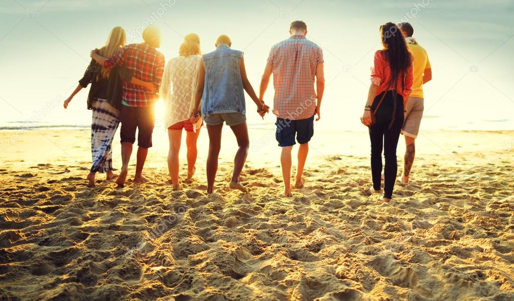 happy friends having fun on the beach