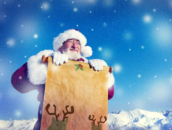 Santa Claus bedrijf Scroll — Stockfoto