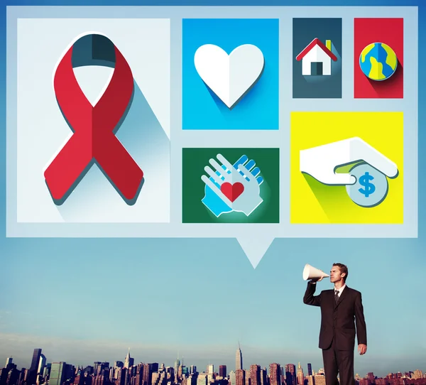 Businessman with megaphone against cityscape — Stock Photo, Image