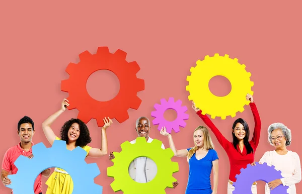 Diversity People holding Gears — Stock Photo, Image